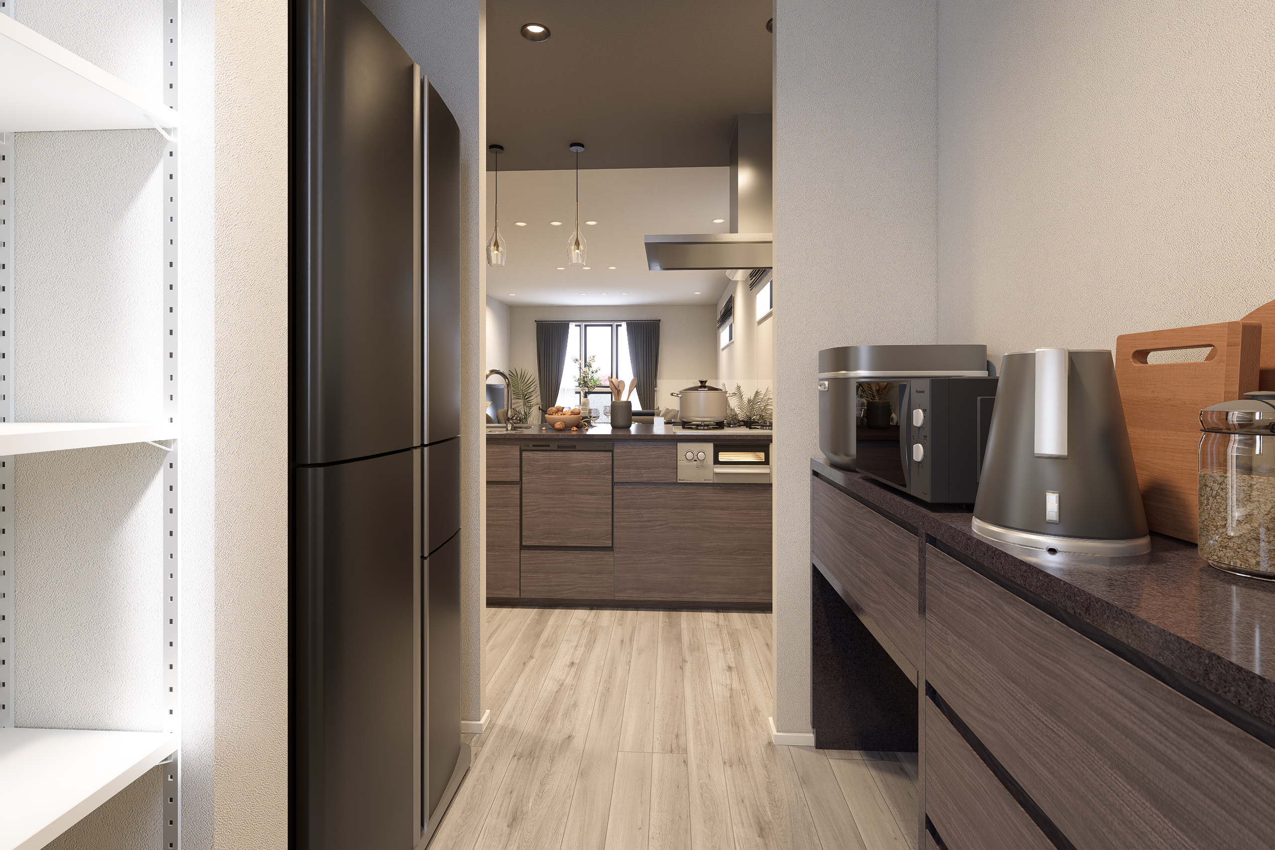 T-5／キッチン背面には冷蔵庫やカップボード置き場を設け、パントリーとしても利用できる物入れも設置しています。