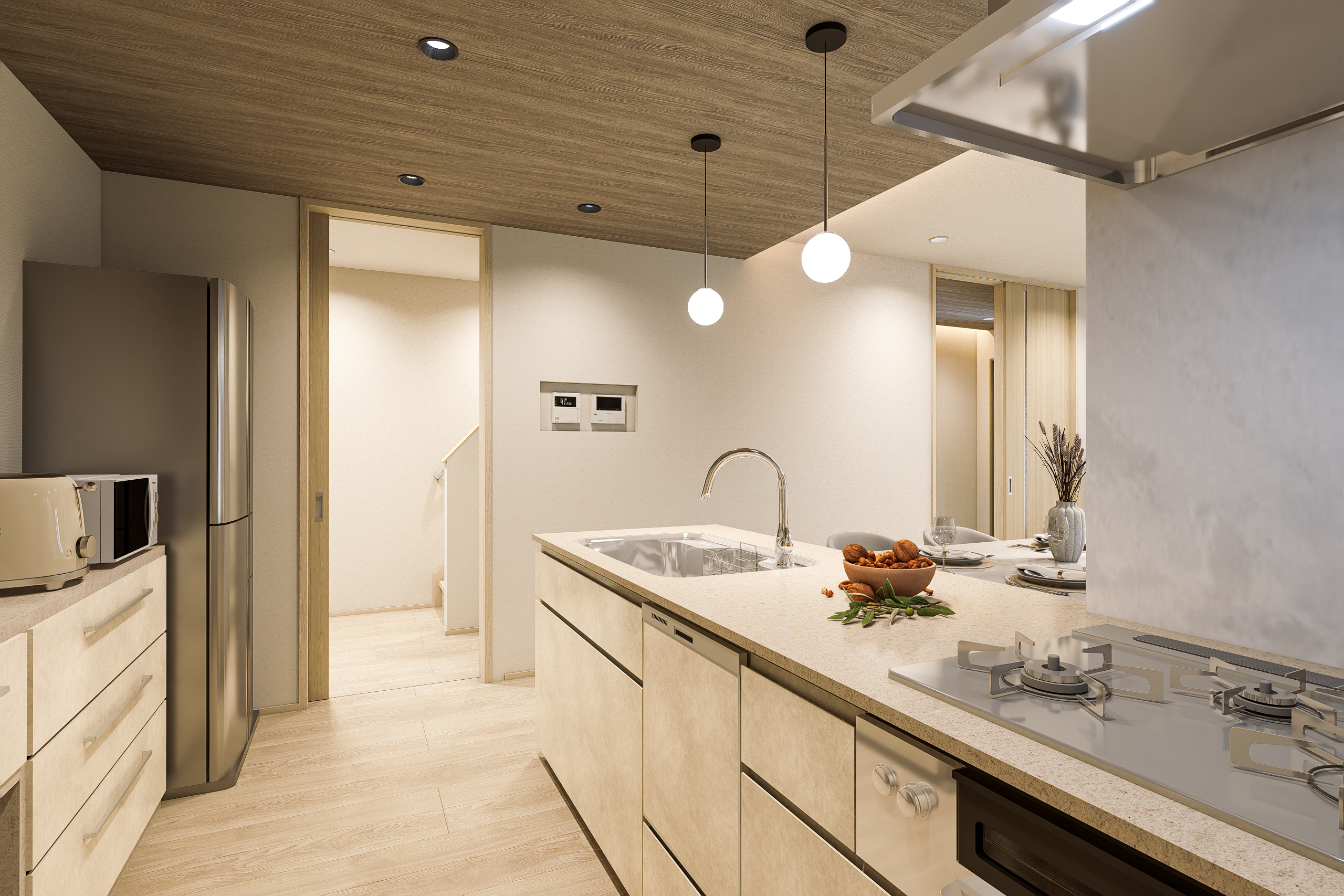 T-2/「木の温もりに包まれたキッチンが、毎日の料理時間をやさしく彩る。家事動線がスムーズにつながる空間は、心にもゆとりをもたらしてくれます。