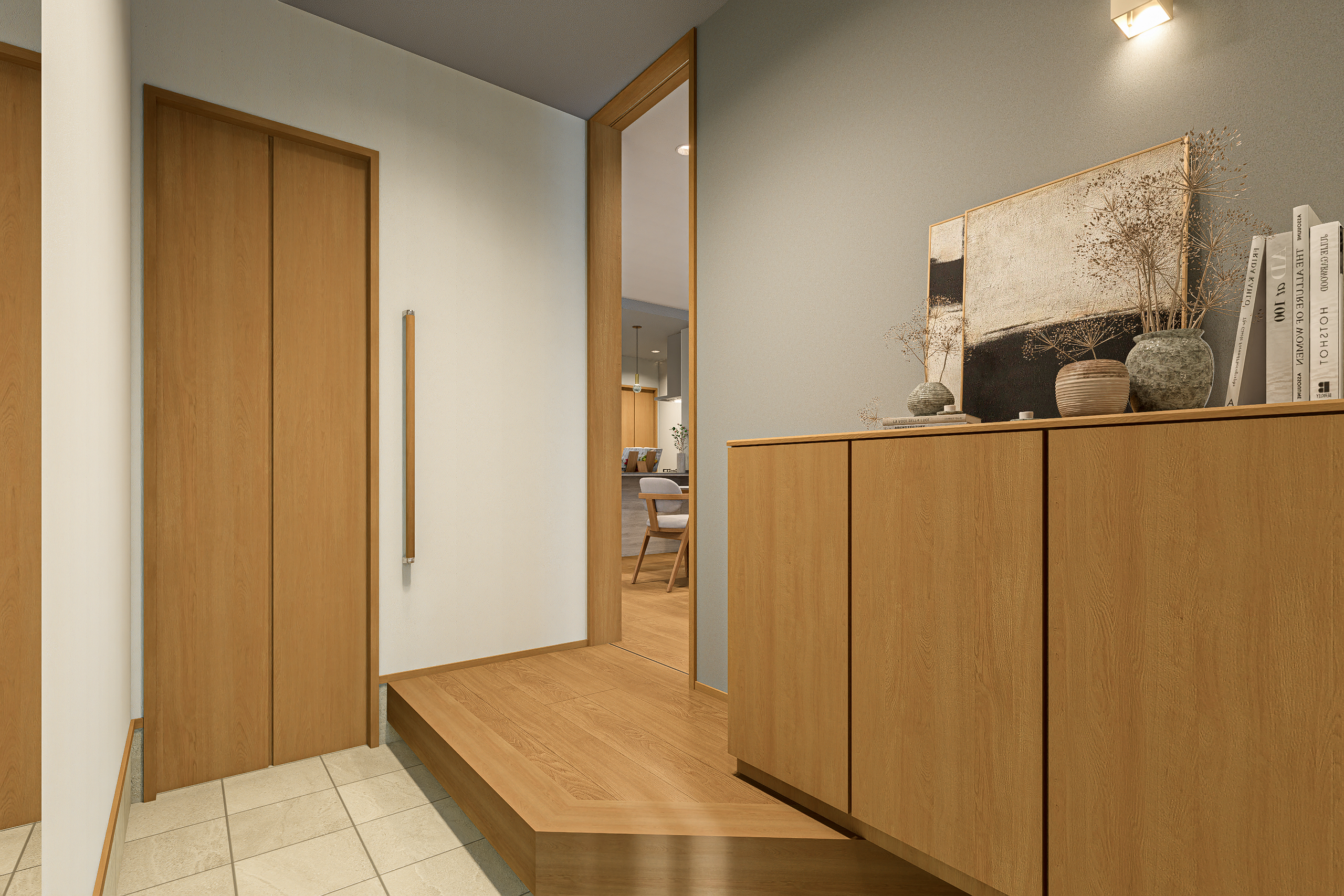 T-1/奥のリビングへと自然につながる動線が、家族の気配を優しく伝え、安心感のある「お帰り」を演出します。