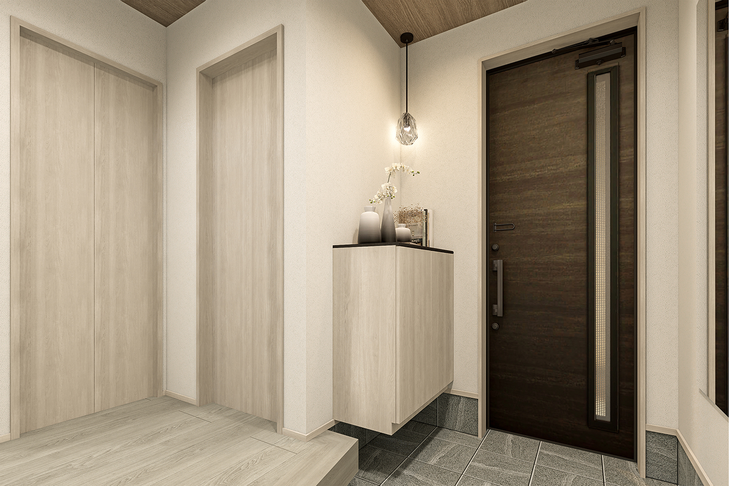 T-1/グレイッシュな色合いでまとめた玄関が、落ち着きのある上質な印象を演出します。